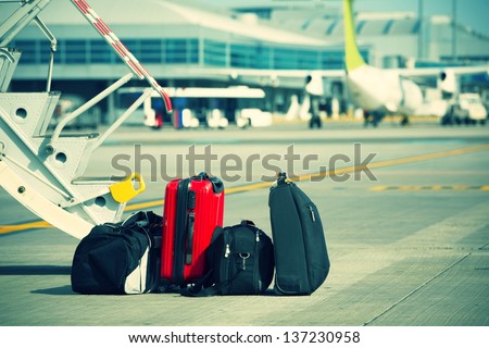 Baggage in front of the airplane