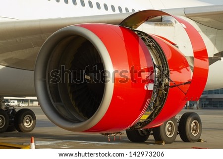 Maintenance of the jet engine before take off.