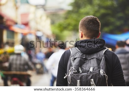 Young traveler with back pack - Hanoi, Vietnam