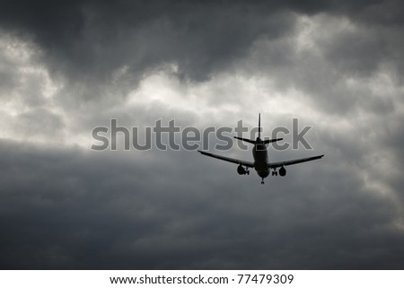 The airplane is landing in the bad weather