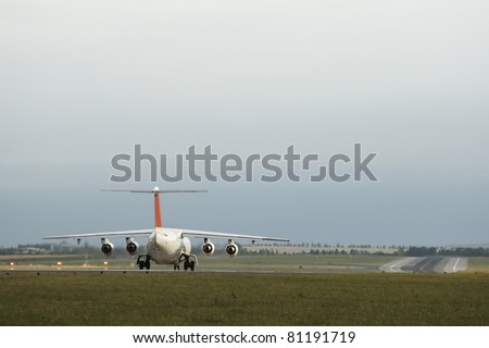 Airplane on begin runway is waiting for take off, Prague Ruzyne Airport.