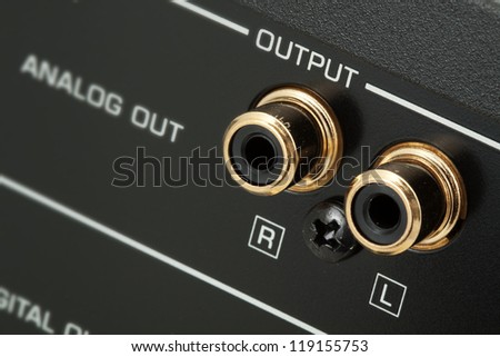 Detail of hi-fi audio system - analog output with narrow focus, colours edited