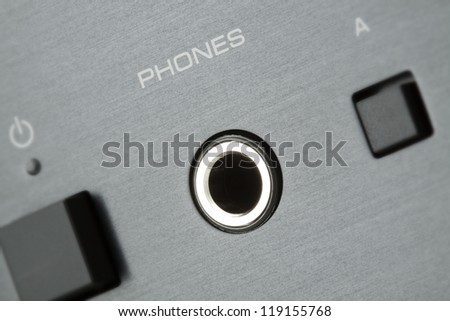 Detail of hi-fi audio system - phones output with narrow focus, colours edited