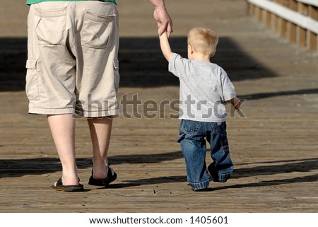 father and son walking. Father And Son Walking Hand In