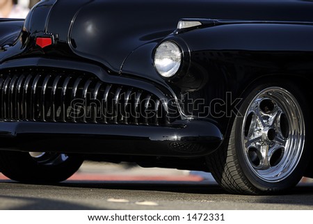 stock photo Classic old car showing only the front fender headlight 