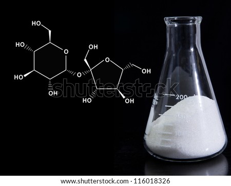 Food science - sugar showing molecular formula of sucrose