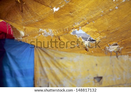 Holes in booth ceilings, Indian market