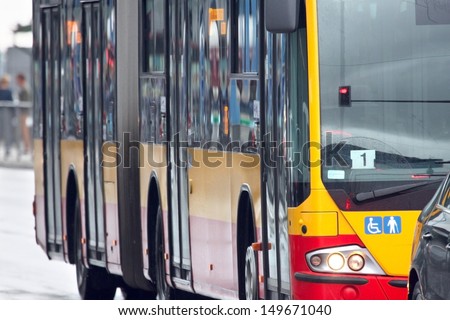 Public transportation, yellow bus background