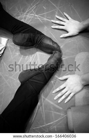 Hands and legs of ballet dancers