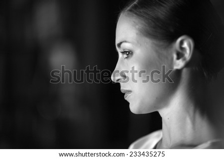 Portrait close up profile of beautiful woman, monochrome