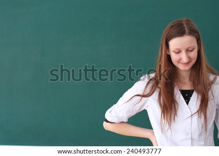 Close up portrait of shy medical student smiling.Image with copy space for text