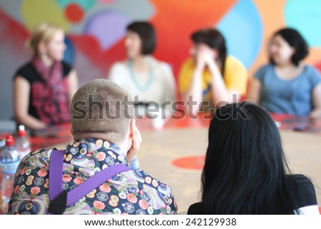 People sitting at the round table