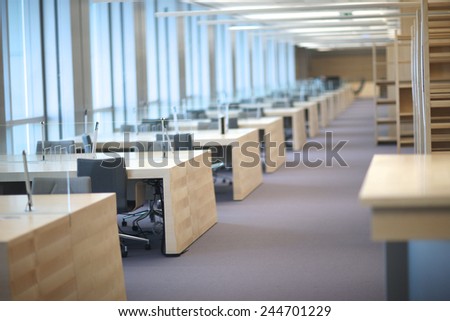 Design of new department office; row of empty tables
