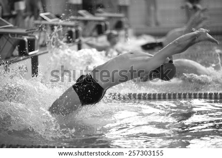 Start of competitive swimming backstroke