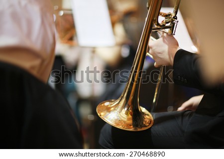 Musician hand holding a trumpet