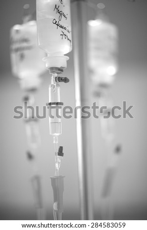 Closeup of intravenous drip system, bag and drip chamber