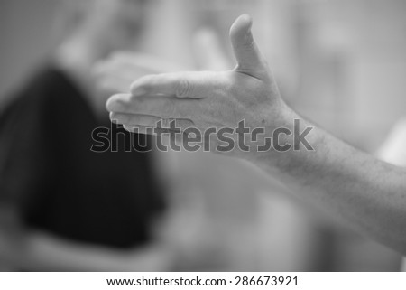 Man\'s hand outstretched, inspiring gesture