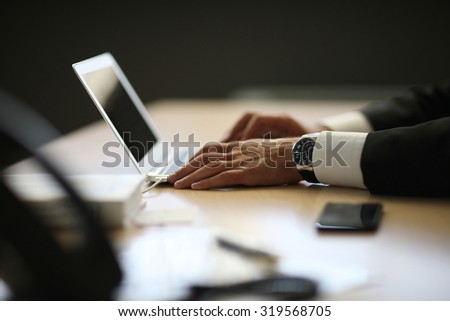 Businessman\'s daily routine, man\'s hands typing