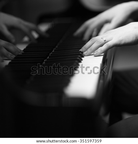 Hands of a pianist playing