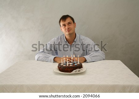 Man at his birthday with cake