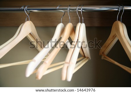 empty hangers for clothes on rail, after sale