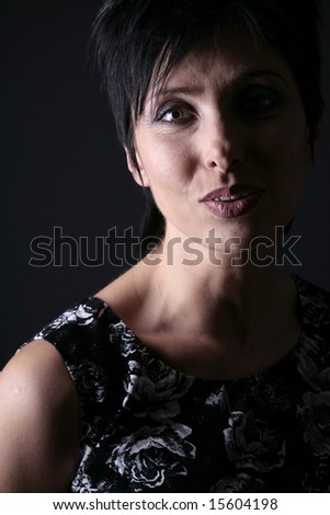 Portrait of woman on dark background