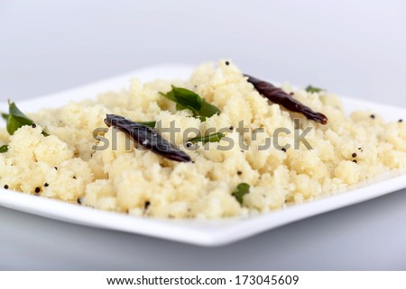 Upma or Uppuma is a common South Indian breakfast dish, cooked as a thick porridge from dry roasted semolina. seasonings of vegetables are often added during the cooking