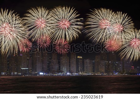 DUBAI, UAE - DECEMBER 2: UAE National Day-2014 celebration with fireworks in JBR Dubai Marina on December 2,2014 in Dubai, UAE