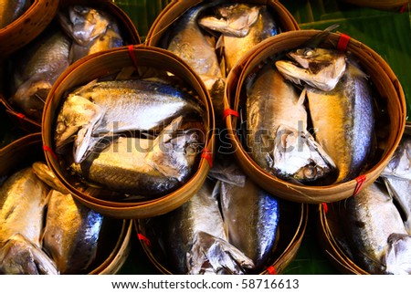 Mackerel fish in bamboo basket, fish from Pacific ocean.