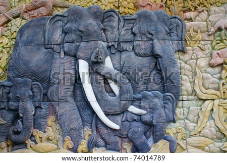 Three carved Thai Elephant on the outdoor temple wall