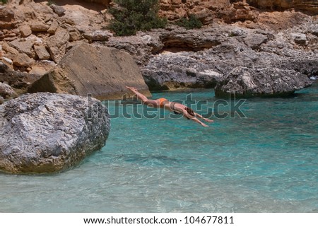 Jump in water. Island Sardinia