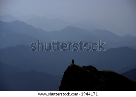Little Man Against Blue Mountains Background