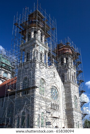 St AdalbertÂ?Â?s Catholic Church: Repair work is being done with new cooper shingles on the top of the basilica of St AdalbertÃ¢Â?Â?s Church in Grand Rapids Michigan.