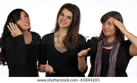 One sister showing off to the embarrassment of the other two sisters,