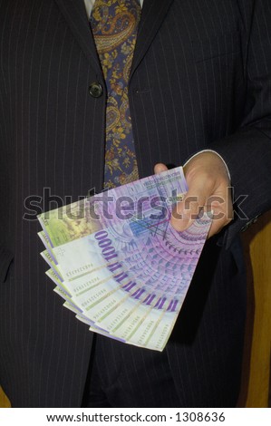 A pin-stripe-suited businessman, offering 8'000 Swiss francs.