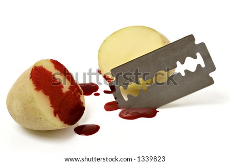 stock-photo-bloody-razor-blade-isolated-over-a-white-background-cutting-a-potato-1339823.jpg