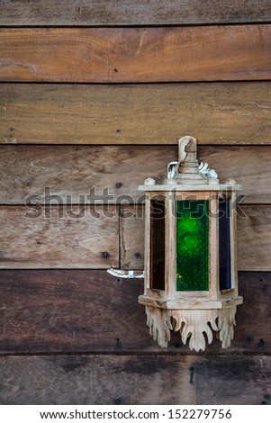 vintage wood lamp on wood wall