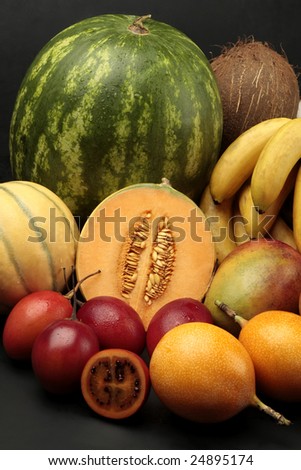 Colorful fruit arrangement on black background