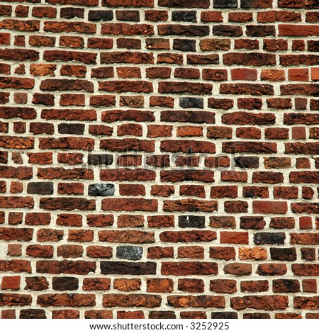 Dark red brick wall from Hampton Court Palace, UK