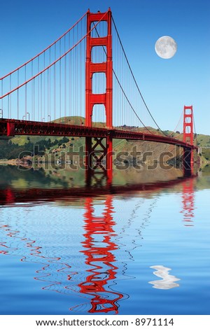 Golden Gate bridge San Francisco reflected in the beautiful still harbor with amazing daytime moon