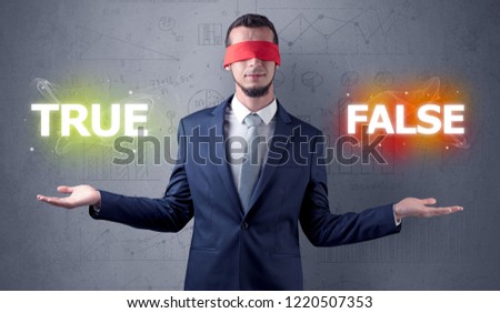 Businessman with red ribbon on his eye deciding true or false