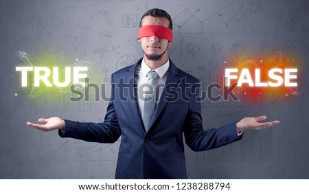 Businessman with red ribbon on his eye deciding true or false