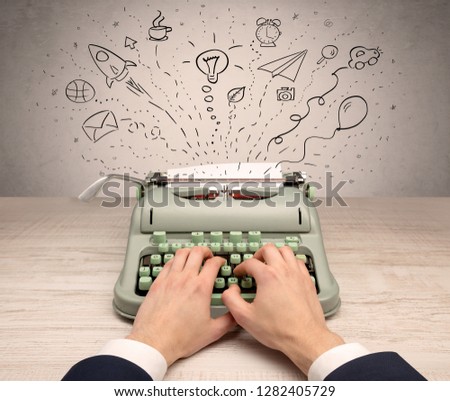 Typewriter with doodles, idea, message, plane, car balloon social media concept