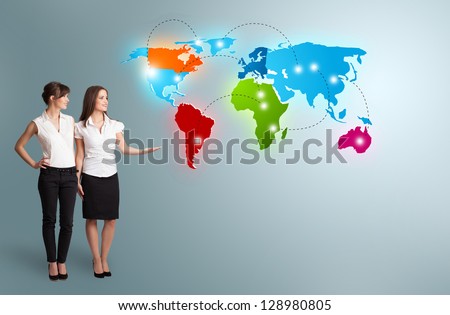 Beautiful young women presenting colorful world map