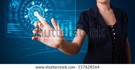 Young woman pressing high tech type of modern buttons