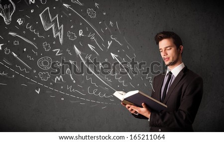 Young man reading a book while hand drawn sketches coming out of the book
