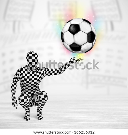 Funny man in full body suit holding soccer ball