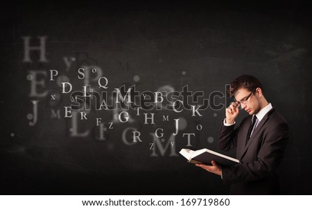 Young man reading a book with alphabet letters coming out of the book