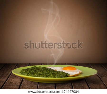 Fresh delicious home cooked food with steam on wood deck