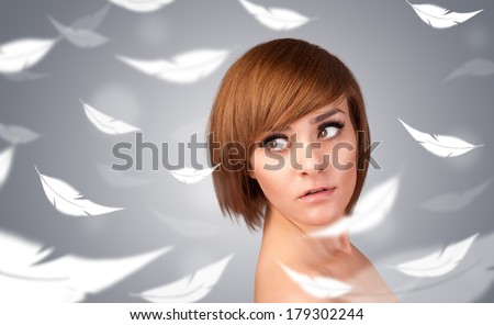 Beautifull young girl with light feather skin concept on gradient background